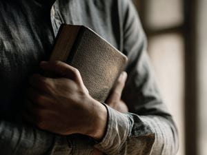 Holding Bible