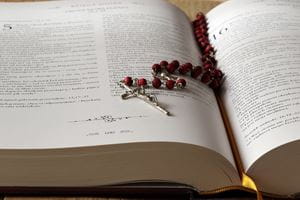 Rosary on Bible