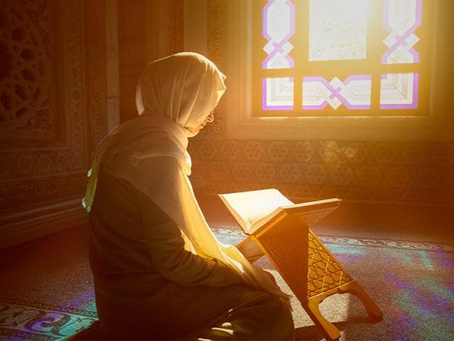 Muslim woman in prayer