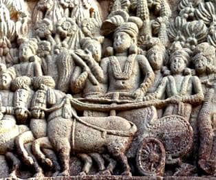 Ashoka riding a chariot in a relief from the Sanchi Stupa, Madhya Pradesh, India.