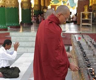 Shwedagon Pagoda, Buddhist prayer, Yangon, Myanmar.
