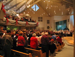 Photo: the congregation of Irvine Presbyterian Church during one of the early Christmas Eve services for children and families