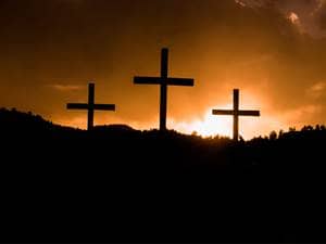 three crosses at sunset